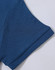 A close-up of a blue polo shirt sleeve, showcasing the textured fabric and stitched details. The shirt has a logo.