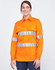 An orange long-sleeve work shirt with reflective tape, featuring a closed front and two chest pockets.