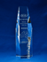 A large, clear crystal trophy in a hexagonal shape, featuring engraving and a logo. The background is blue.