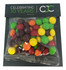 A transparent bag filled with colourful Skittles in red, yellow, green, orange, and purple, featuring a branded header.