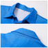 A bright blue men's button-up shirt made of 100% cotton, featuring a classic collar and a subtle logo.