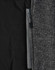 A grey heather fabric with a quilted black interior and a zippered pocket detail. The jacket has a sleek design.