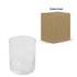 A clear whiskey glass with a slight taper, next to a simple brown cardboard box.