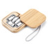 A Reveal Square Cable Set in a bamboo case, featuring multiple charging cables neatly stored inside.