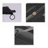 A black nylon mesh flat cosmetic bag featuring a zip closure and a metal ring detail.