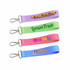 A set of four colourful sublimation keyrings in green, pink, purple, and blue, each with a different printed design.