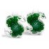 Two clear acrylic dollar symbols filled with green mini jelly beans, featuring a logo on the front.