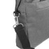 A grey laptop bag featuring a textured surface, with a silver clip and a black strap. It has a front pocket.