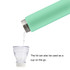 A drink bottle in mint green with a stainless steel finish, pouring into a transparent cup. It has a logo on the side.