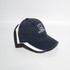 A navy blue baseball cap with a grey and white accent, featuring a logo on the front.