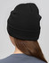 A black beanie made from rPET, displayed from the back on a model with long hair. It features a logo.