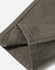A close-up of the hem of khaki ladies' flexi chino pants, featuring a clean finish and tailored stitching.