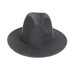 A black felt wide brim fedora hat with a smooth texture and a rounded crown, featuring a logo on the interior.