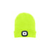 A bright yellow beanie with an integrated headlamp on the front, featuring a black panel.