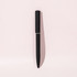 A black ballpoint pen with a mirror finish, featuring a sleek design and a cap. It includes a logo.