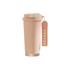 A drink bottle with a pink body, gold base, and a tag labelled 'COFFEE'. It features a secure lid and a sleek design.