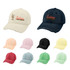 A collection of vintage baseball caps in various colours, including cream, navy, pink, black, yellow, red, and green, featuring logos.