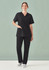 Unisex black V-neck scrub top with short sleeves, paired with matching black scrub pants and casual shoes.