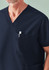 A navy unisex V-neck scrub top featuring a chest pocket with a pen. It has a minimalist design and a branding logo.