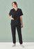 A black V-neck scrub top paired with matching black pants, displayed on a model against a soft green background.