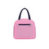 A pink insulated lunch bag with a navy blue handle and a front zippered pocket. It features a plain design and a logo.