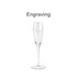 A tall, clear glass champagne flute with a tapered design and an engraved logo.
