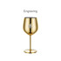 A stainless steel wine goblet in a gold finish, featuring a stem and a logo.