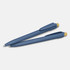 A blue recycled plastic pen with a yellow tip and a clip, positioned alongside another identical pen.