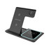 A black 15W 3-in-1 fast wireless charger with a stand and multiple charging surfaces. Phonelike branding visible. A black 15W 3-in-1 fast wireless charger with a stand and multiple charging surfaces. Phonelike branding visible.