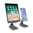 A black foldable phone and tablet stand, with a tablet on the left and a smartphone on the right, both displayed upright.