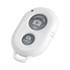 A white selfie button with two buttons labelled for camera functions and an on/off switch.