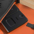 A black magnetic wireless charger and USB adaptor resting in an orange bag, showcasing its sleek design. A black magnetic wireless charger and USB adaptor resting in an orange bag, showcasing its sleek design.