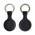 A silicone Airtag case in black with a keyring attached, featuring a smooth, round design.