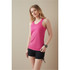 A model is wearing a pink women's active sports top paired with black shorts. The top features a logo.