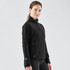 A black women's ultra-light shell jacket with a zip front and two side pockets. It features a logo on the sleeve.