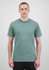 A green short sleeve tee displayed on a male model against a neutral background, featuring a logo.