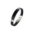 A black metal folding lock clasp bangle featuring silver accents and a sleek design. Includes a logo.