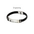 A black leather twine bracelet featuring a silver clasp and a logo engravings on a metal plate.