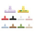 Ten plastic clips in various colours, including purple, red, black, white, pink, brown, and green, arranged in two rows.