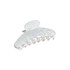 An acetate hair clip in a pearlescent white colour, featuring a curved design with multiple grip teeth.