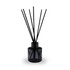 A round, 50ml classic reed diffuser in a black glass bottle with black reeds. Features a simple design.