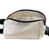 A cream cotton belt bag with a zippered closure and black trim, featuring an open interior.