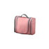 A pink travel large capacity storage bag with grey accents and zipper compartments. It has a sturdy handle for easy carrying.