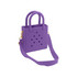 A mini beach bag in purple with holes and dual handles, featuring a detachable shoulder strap.