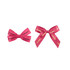 Two pink adhesive bows displayed side by side, with text printed on them. One is smaller, the other larger.