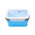 A reusable silicone food storage container in blue, featuring a clear lid and a secure closure mechanism.