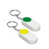 Two pill boxes in white with circular green and yellow buttons, attached to keychain rings.