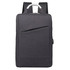 A grey laptop backpack with a sleek design and shoulder straps, featuring a front zip pocket and a logo.