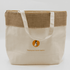 A jute and cotton cooler bag in natural and beige colours, featuring a logo on the front.