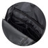 A black backpack interior featuring multiple compartments and a sleek design. It has a logo visible inside.